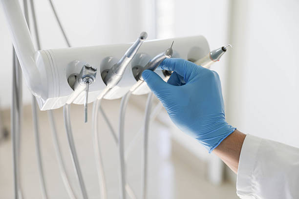 Professional Tooth Extraction technician working in Hallandale Beach, FL